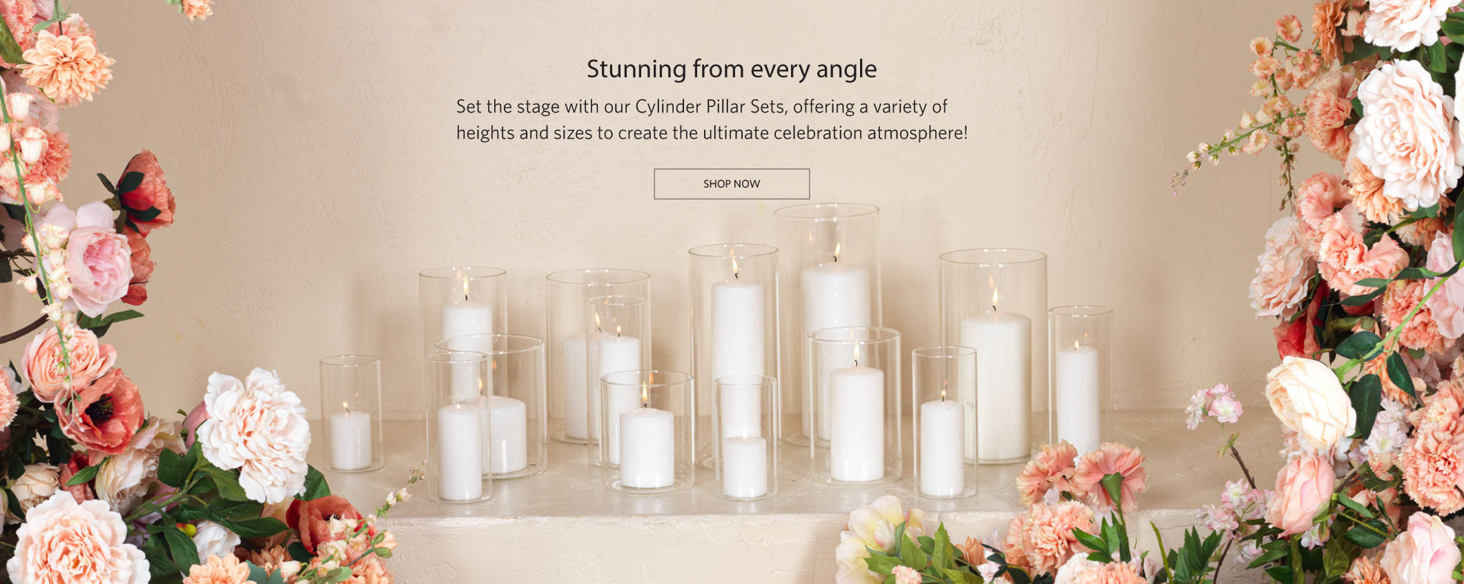 Pillar candles with cylinder glass vases in different heights